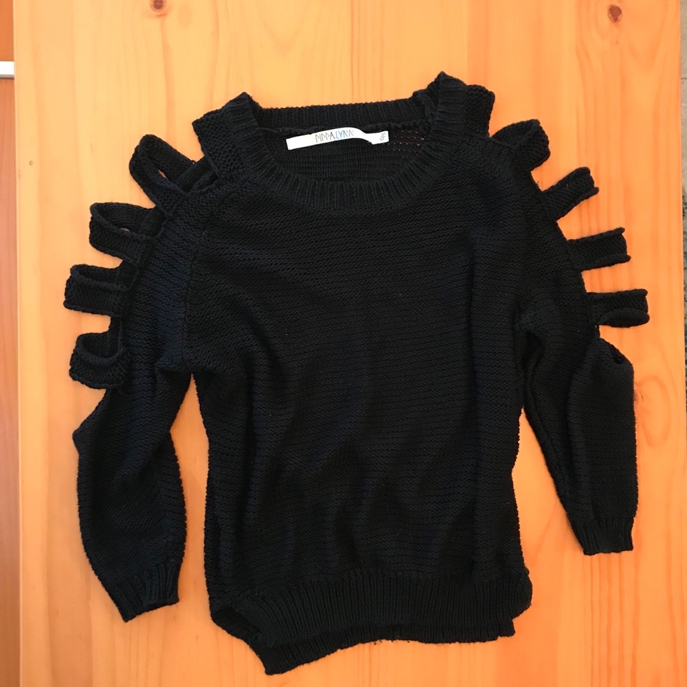 Black sweater with cut outs from LF